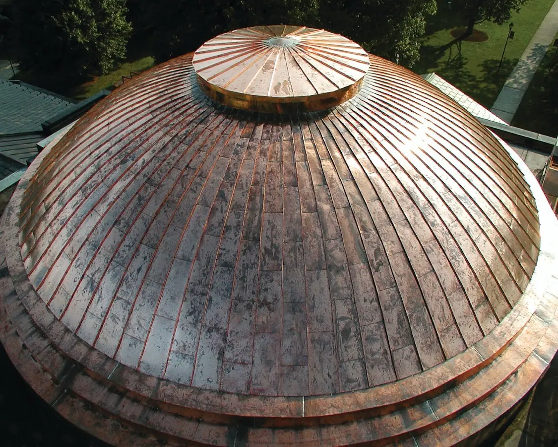 Craftsman Roofing crew installing a new roof in Belpre